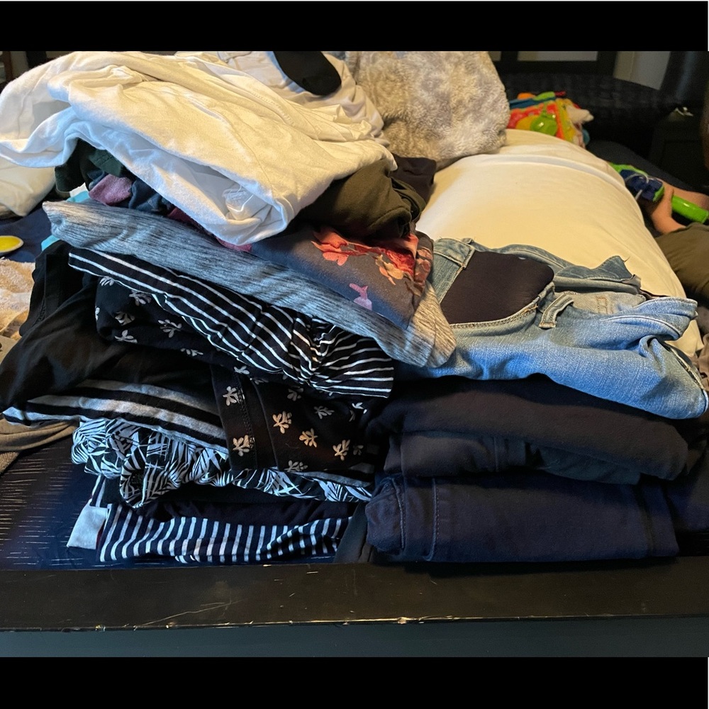 A lot of maternity clothes. Sizes L, XL. dresses, jeans, leggings, shirts.